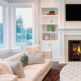 White extension room with all white furniture and white walls